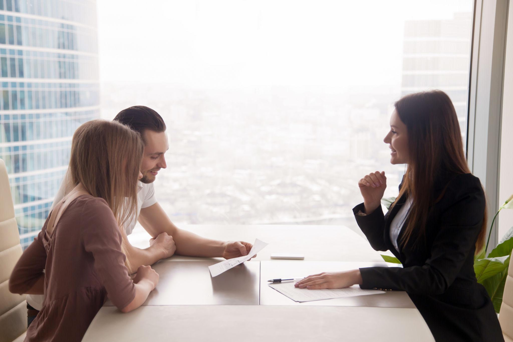 Real estate advisor meeting with clients